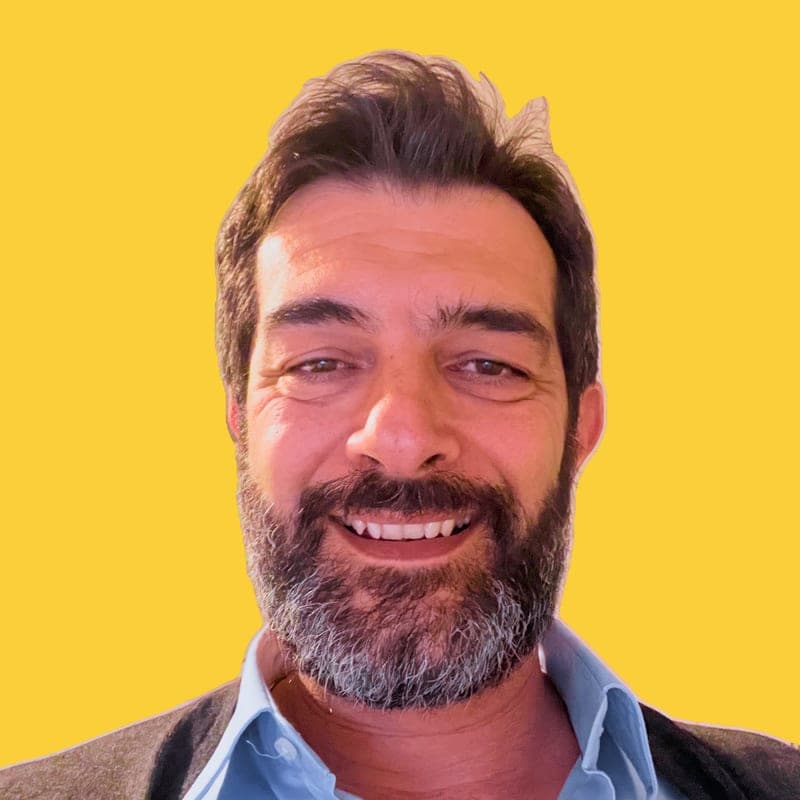 Portrait of Luca Capone, non-technical founder building AI products at 50